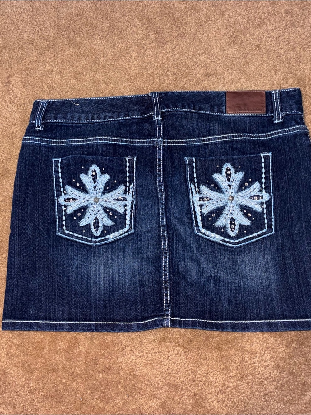 Maurices Dark Blue Denim Mini Skirt with Light Blue Embroidered Pockets